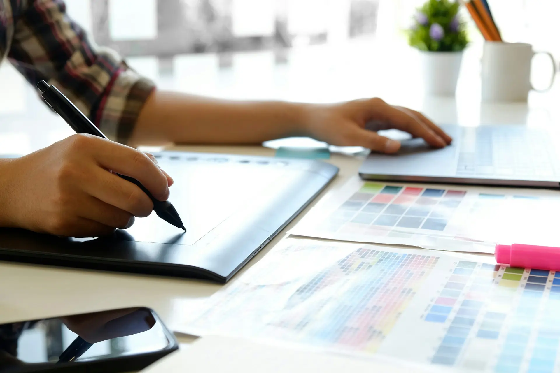 A person writing on a pad